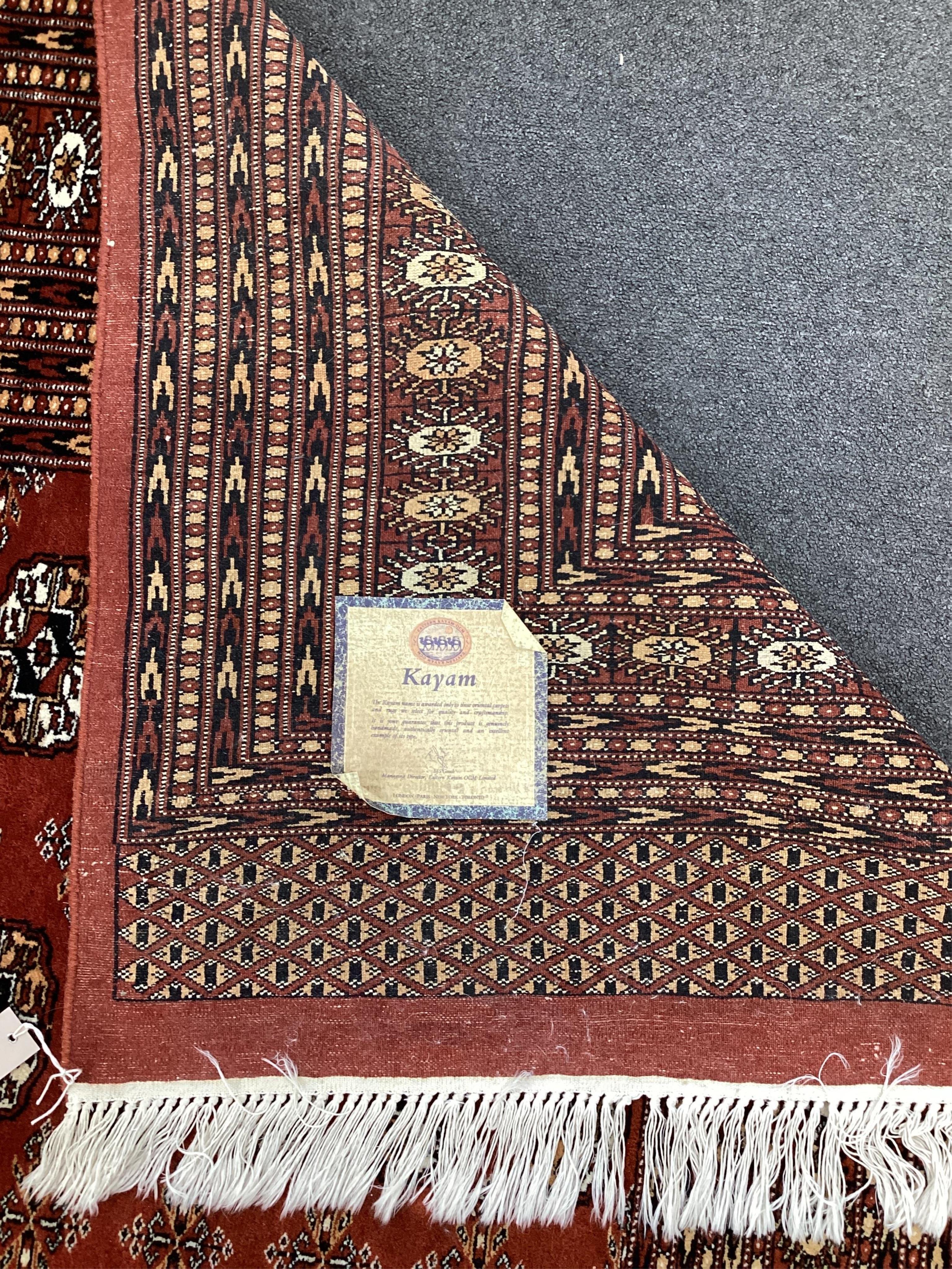 A Bokhara red ground carpet, 410 x 310cm. Condition - good